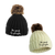 Be Good to People Signature Fleece Faux Pom Hat Knit hat with  faux fur pom on top shown in black with white Signature BGTP logo embroidered on cuff and white with black BGTP Signature logo embroidered on front